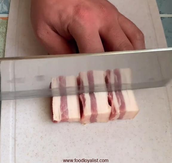 Cut pork into cubes and set aside