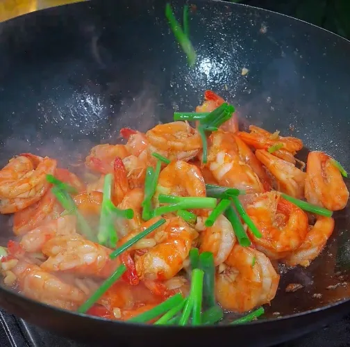Sprinkle chopped scallions on top and take out of the pot